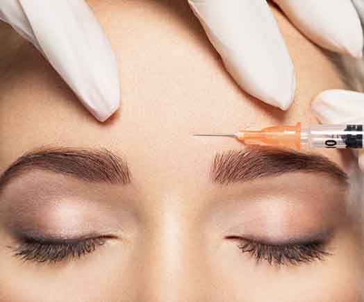 Woman getting BOTOX injection